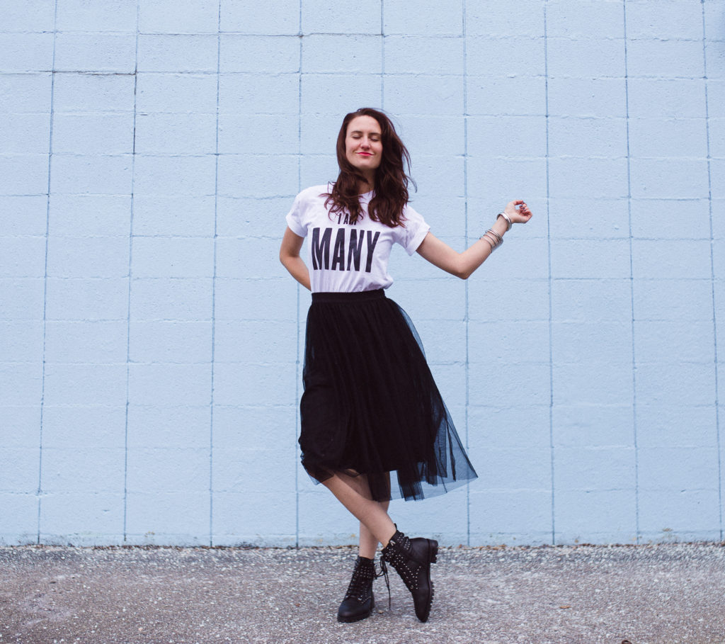 Graphic tee and black skirt
