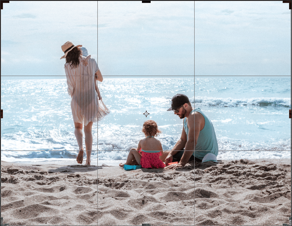 This photo was edited with the two horizontal lines in mind -- the water line and horizon line. The subjects were also cropped in a way that generally aligned to the two vertical lines. (Though not perfect!)