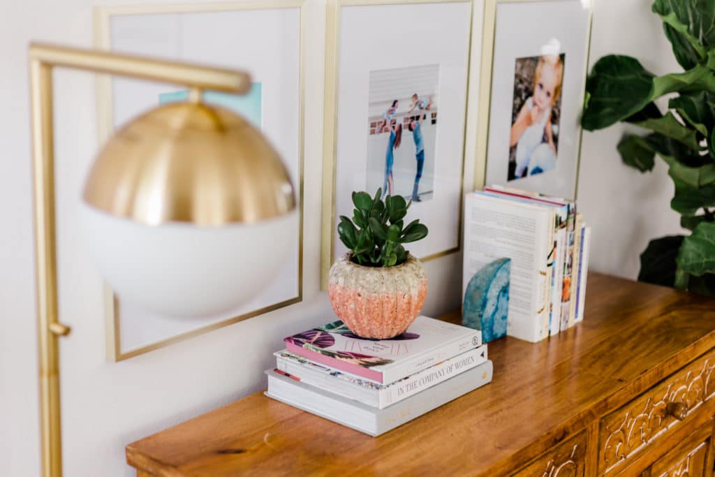 Gallery wall, gold accent lamp