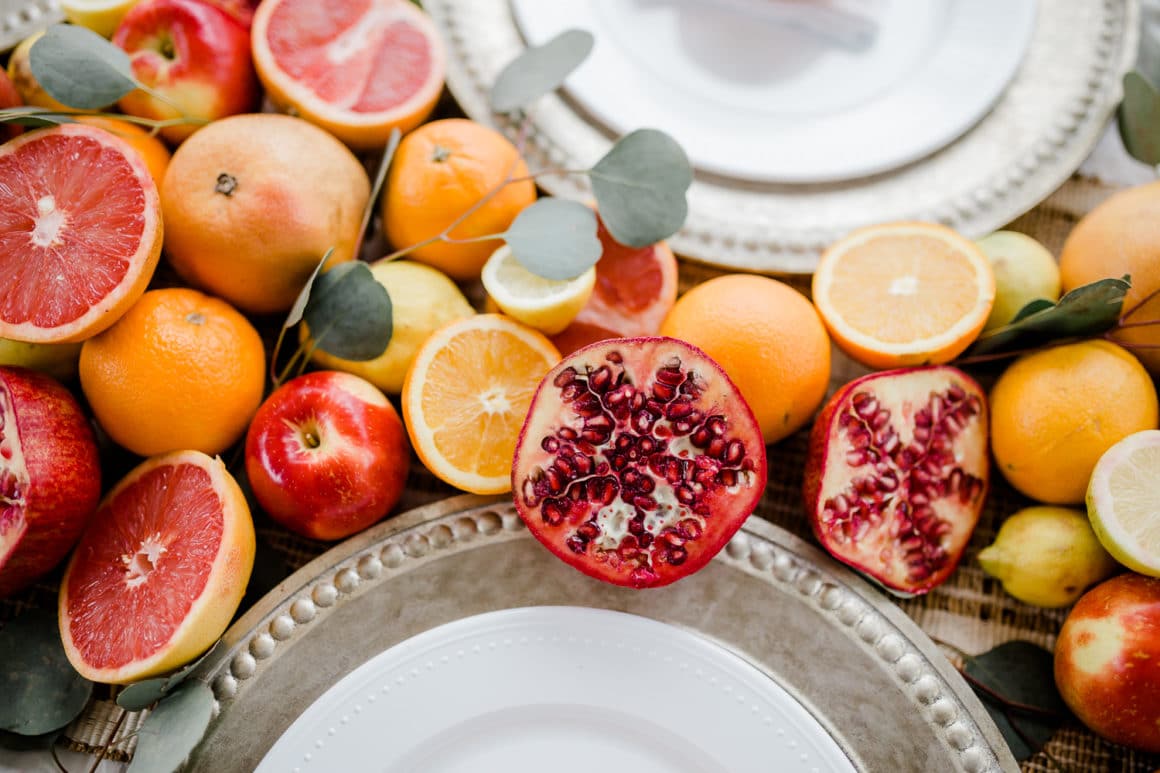 pomegranates as decor Citrus themed table decor, pomegranates as decor
