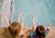 Kicking in the pool, Toddlers learning to swim | 4 (Surprising!) Ways Goldfish Swim School Benefitted My Kids This Year